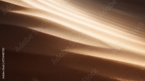 Fototapeta Naklejka Na Ścianę i Meble -  A sand dune with clean, flowing lines created by the wind.