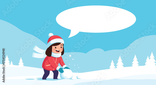 A happy child plays in the snow building a snowman.