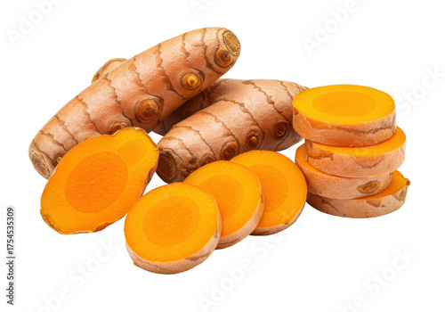 Canvas Print Isolated fresh turmeric root cut in slices showing orange color and healthy spic
