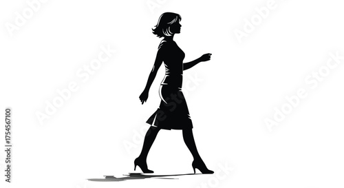 Silhouette of a confident woman walking with purpose, casting a shadow on a white background.