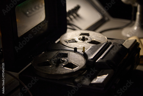vintage reel-to-reel tape recorder in a secret office