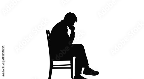 Silhouette of a pensive man sitting on a chair with his hand on his chin, deep in thought.