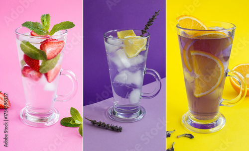 Collage. Cold lemonade or infused water with strawberry, lemon, lavender flower and iced blue flower tea with orange in the drinking glasses on a colored background.