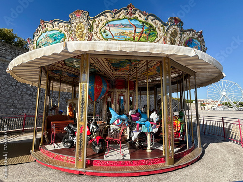 View of the children's carousel on a summer day. Close-up. Antibes. France.
