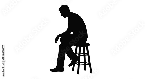 Silhouette of a man sitting on a stool, symbolizing contemplation or waiting
