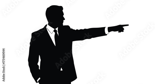 Silhouette of a businessman in a suit pointing forward, ideal for business or guidance concepts
