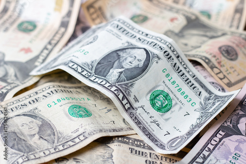 1 US dollar bill with a portrait of George Washington in close-up
