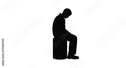 Silhouette of a man sitting with head bowed, conveying a sense of sadness or contemplation