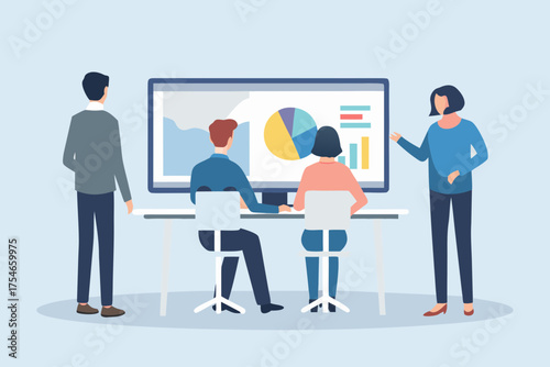 Diverse team of professionals collaborating around a computer screen displaying charts and graphs during a meeting