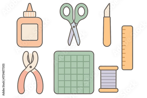 Essential crafting tools and supplies set including scissors, glue, ruler, and cutting mat