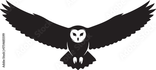 Silhouette of a barn owl in flight spreading its wings wide isolated