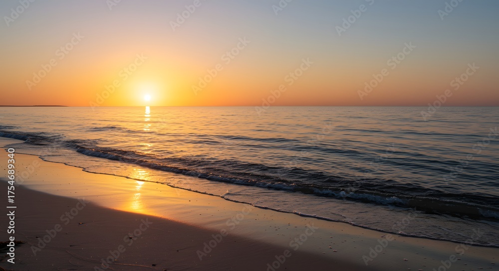 Fototapeta premium Sunrise over a peaceful beach on summer solstice, golden light, calm waves, minimal composition.