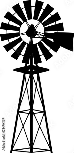 Farm windmill silhouette. A black silhouette image of a traditional farm windmill with circular blades and a lattice tower, rural agriculture and energy production. Vector clipart illustration design