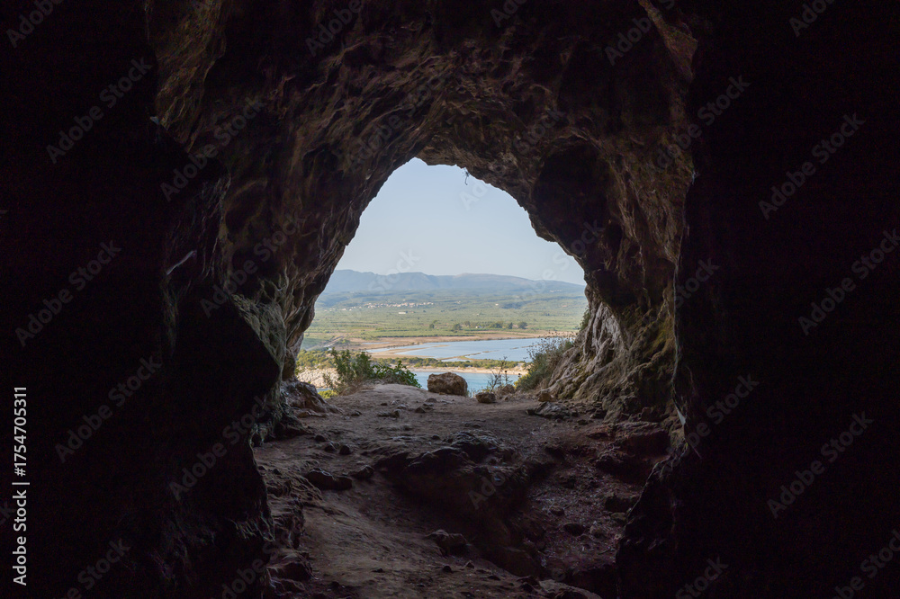 Fototapeta premium This landscape photo was taken in Europe, Greece, Peloponnese, Messinia, in summer. It shows Nestor s Cave in Navarino in Messinia (Peloponnese), under the Sun.