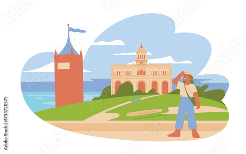 Tourist visiting historic landmark castle and tower in scenic landscape