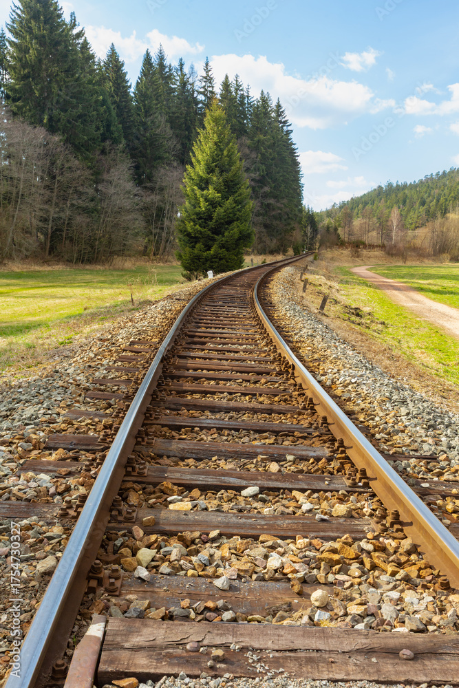 Obraz premium Railway tracks near National Nature Reserve Adrspach-Teplice Rocks. Bohemia region, Czech Republic