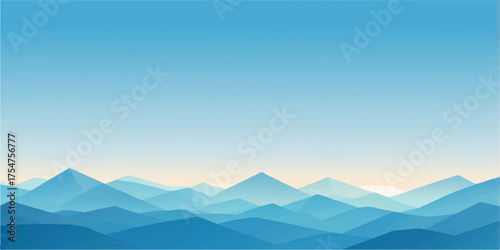 A beautiful mountain landscape with clouds and fog at sunrise over a valley and forest