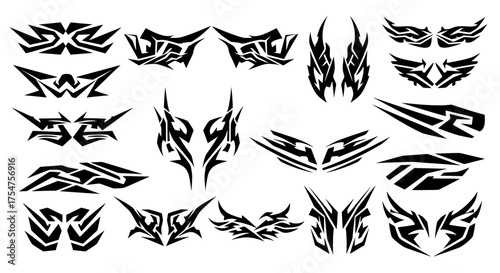 Set of aggressive modern tribal vector graphics. Sharp, futuristic abstract shapes for car decals, body art tattoos, stencils, and edgy branding projects.