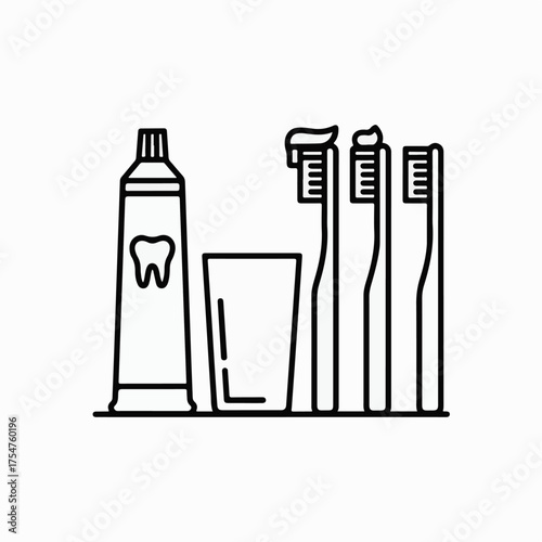 Essential daily oral hygiene tools for maintaining healthy teeth and fresh breath, featuring toothpaste, toothbrushes, and a rinsing glass, perfect for dental care routines and personal wellness