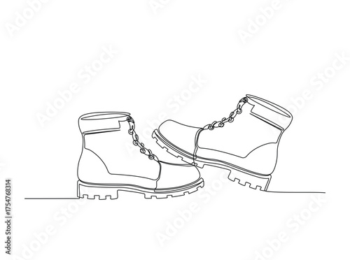 Hiking boots  in single outline illustration. Continuous line art drawing of working boot. Editable stroke.