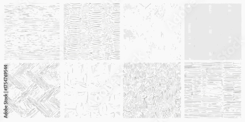 Collection of eight abstract monochromatic textured background patterns in grayscale tones