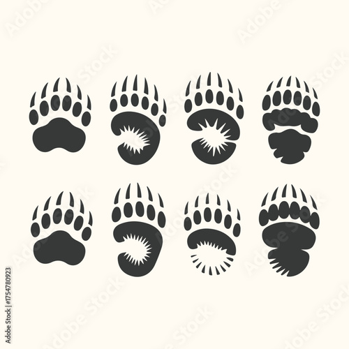 Vector art of set of eight stylized bear paw prints in black on a cream background