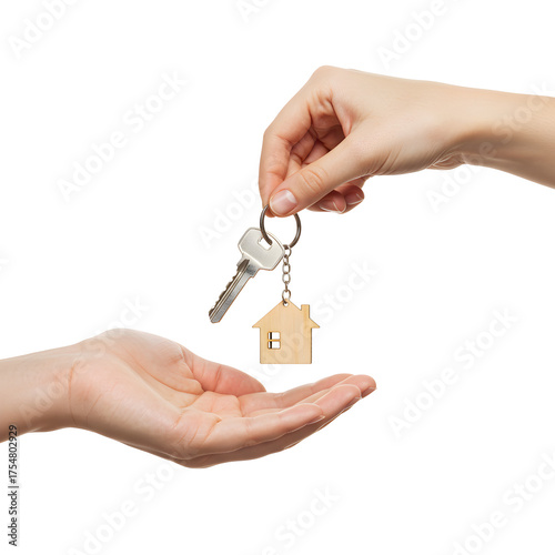 Handing over the house key to a new owner, representing home ownership and real estate transaction