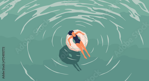 A person floats peacefully on an inflatable ring in serene blue water with ripples.