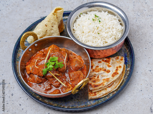 Traditional Indian Mutton Curry (Rogan Josh) Thali with Rice and Paratha