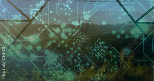 Displaying cyan-green circuit traces and nodes over calm lake at sunrise, with diagonal grid lines