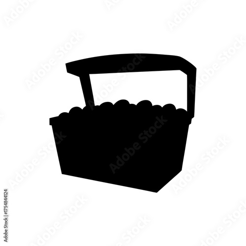 Silhouette image of a treasure chest filled with valuable items in the dark