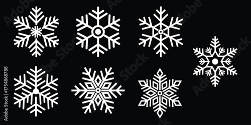 Collection of white snowflake icons on a black background