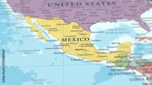 4K macro footage of Mexico on a world map with shallow depth of field. Focus on word Mexico and nearby regions like the United States, Central America, and the Gulf of Mexico. Travel geography footage