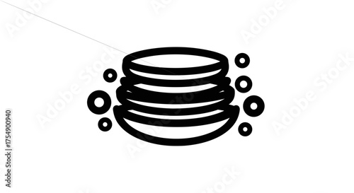 Stack of clean plates ready for washing in the kitchen.