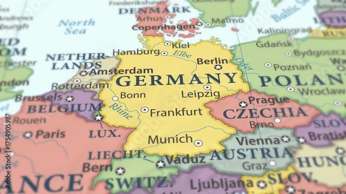 4K macro video of Germany on a world map with shallow depth of field. Focus on word Germany and surrounding areas including France, Poland, Austria, and the Netherlands. Travel geography footage