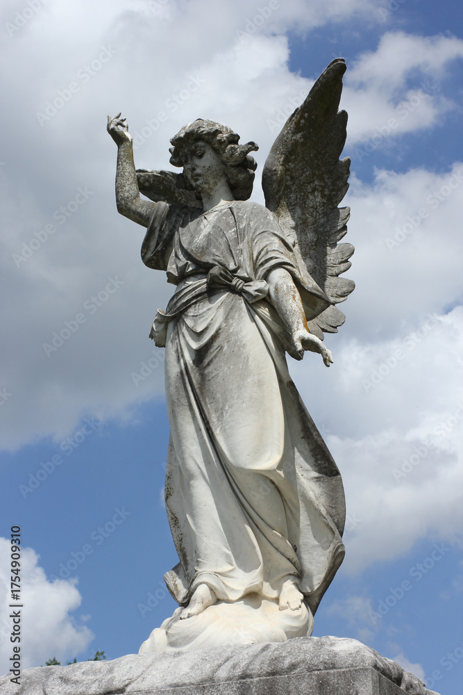 Fototapeta premium Historic Statue From Late 1800s in Rural Cemetery. East Texas