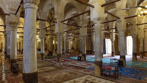 Walking through prayer rooms of historic Grand Mosque of Sfax, an important place of worship in Tunisia's second largest city