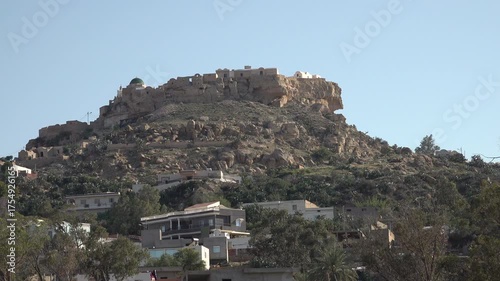 View towards spectacular Berber Takrouna village, built on a strategic hilltop, historic landmark and heritage in Tunisia