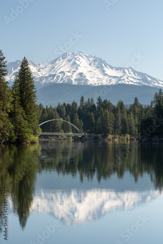 Mount Shasta reflection with an arched bridge in the foreground
