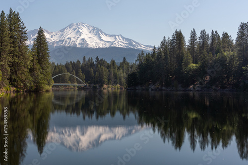 Mount Shasta reflection with an arched bridge in the foreground