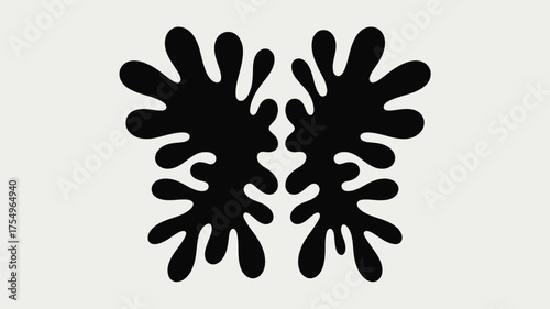 Two black inkblots symmetrically arranged on a white background creating an abstract pattern art