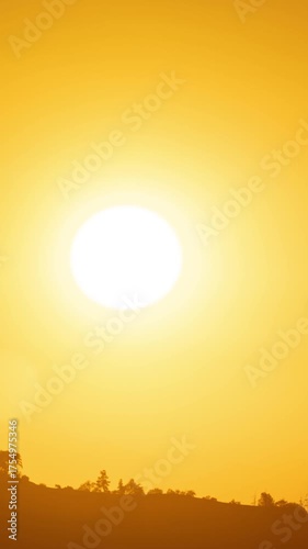 Wallpaper Mural Time Lapse of the sun rising from behind the mountains in Los Angeles. Vertical Video. Torontodigital.ca