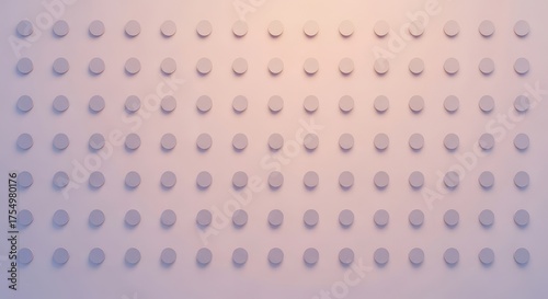 Array of round objects on pale pink surface