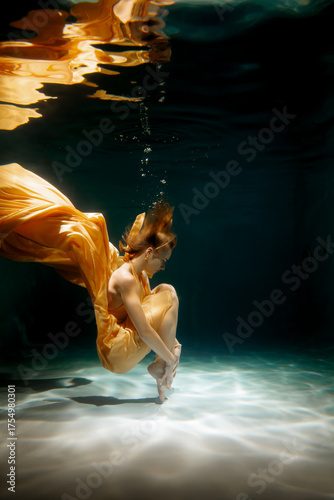 An Ethereal Underwater Dance Featuring Flowing, Weightless Fabric that Enchants the Eye
