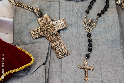 Catholic metal crucifixes in a religious shop window in Spain