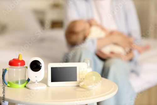 Baby monitor with bottle an...