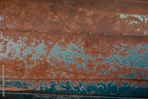 Old rusted car element. Grunge background