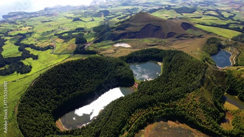 Azores island incredible nature sceney of volcanic craters. beautiful Sao Miguel . view point of Miradouro do Pico do Paul with small lakes. aerial drone 4k hd video