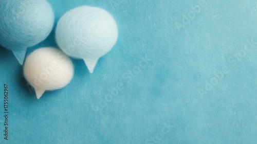 Three Felt Speech Bubbles on a Blue Background for Creative Communication Ideas