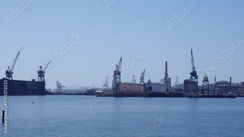 Industrial Harbor and Cargo Cranes by the Water